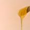 liquid-sugar-wax-on-spatula-beige-2021-09-02-12-43-20-utc